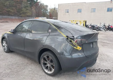 2023 Tesla Model Y Awd/Long Range Dual Motor All-Wheel Drive z USA, uszkodzony, nr VIN 7SAYGDEE9PA177555